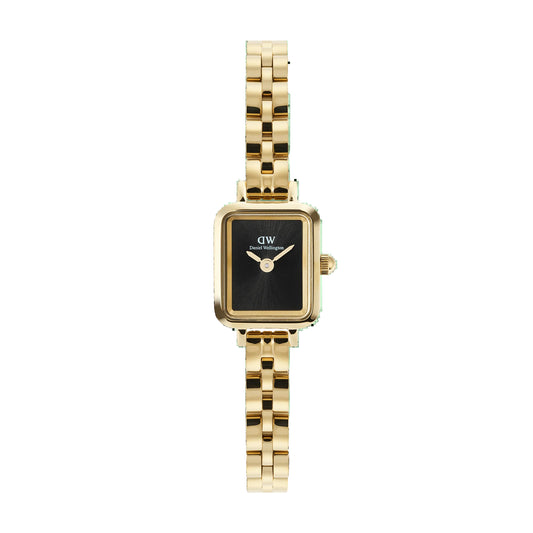 Gold watch with black face on a white background
